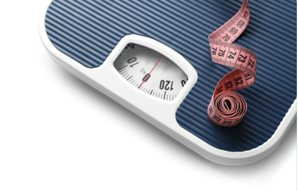 Blue measuring scale with a red tape measure.